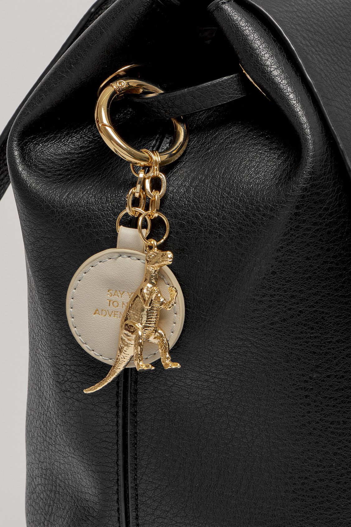 ESTELLA BARTLETT COPPERFIELD DRAWSTRING BACKPACK WITH STONE BAGTAG AND DINO CHARM EBP3273 BLACK